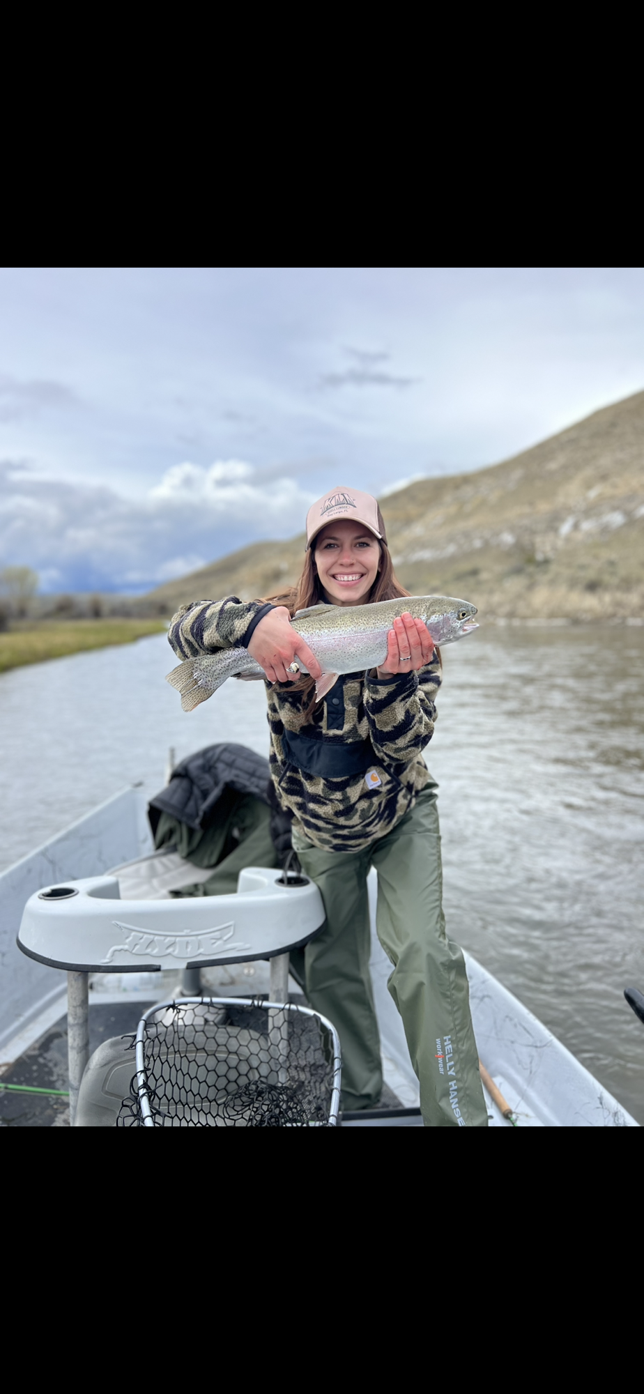 Catching a trout on a drift boat with Teton South Fish and Float